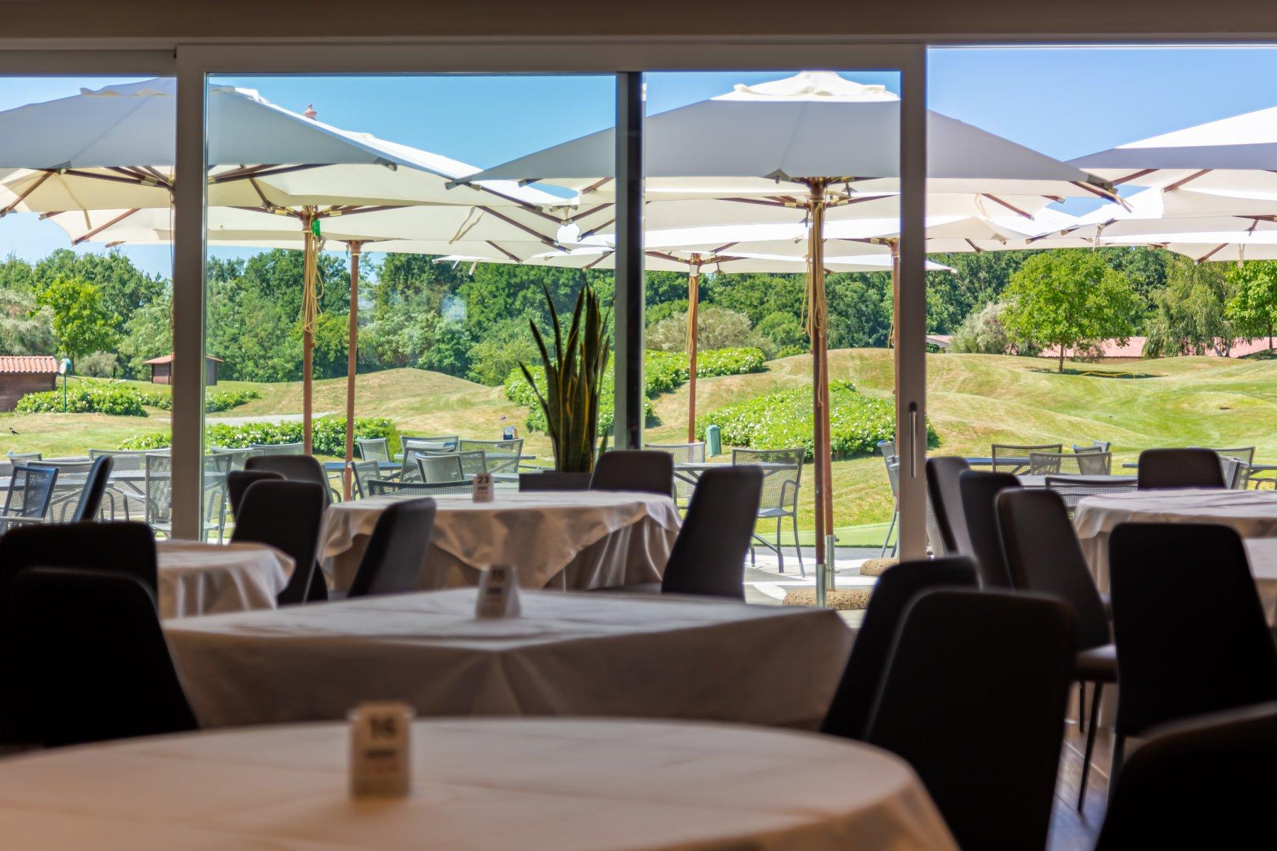 Restaurant dining room overlooking the course at Bogogno