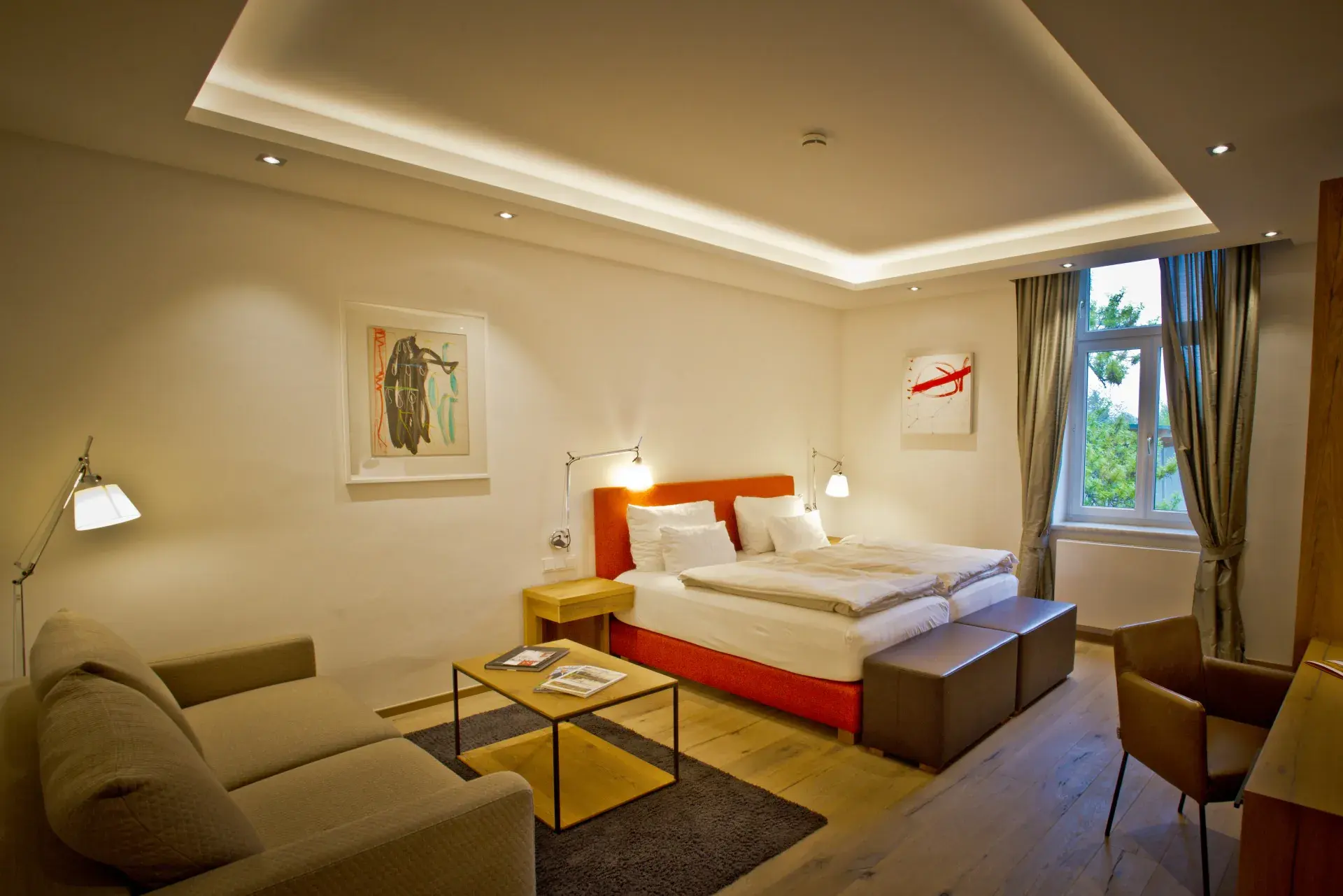 Standard room with a double bed and seating area at Diamond Country Club