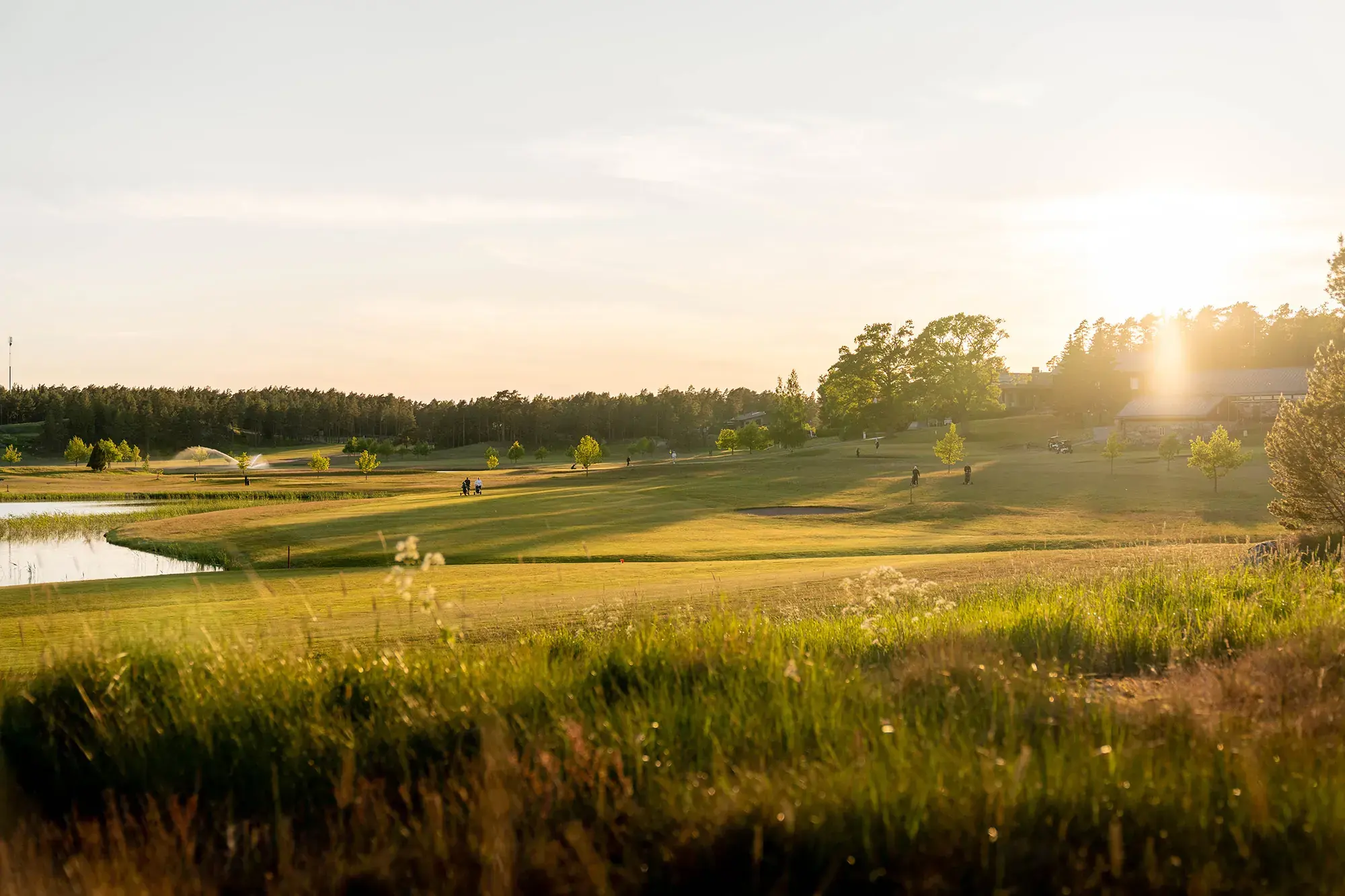 Lakeside golf course at sunset at Kultaranta Resort