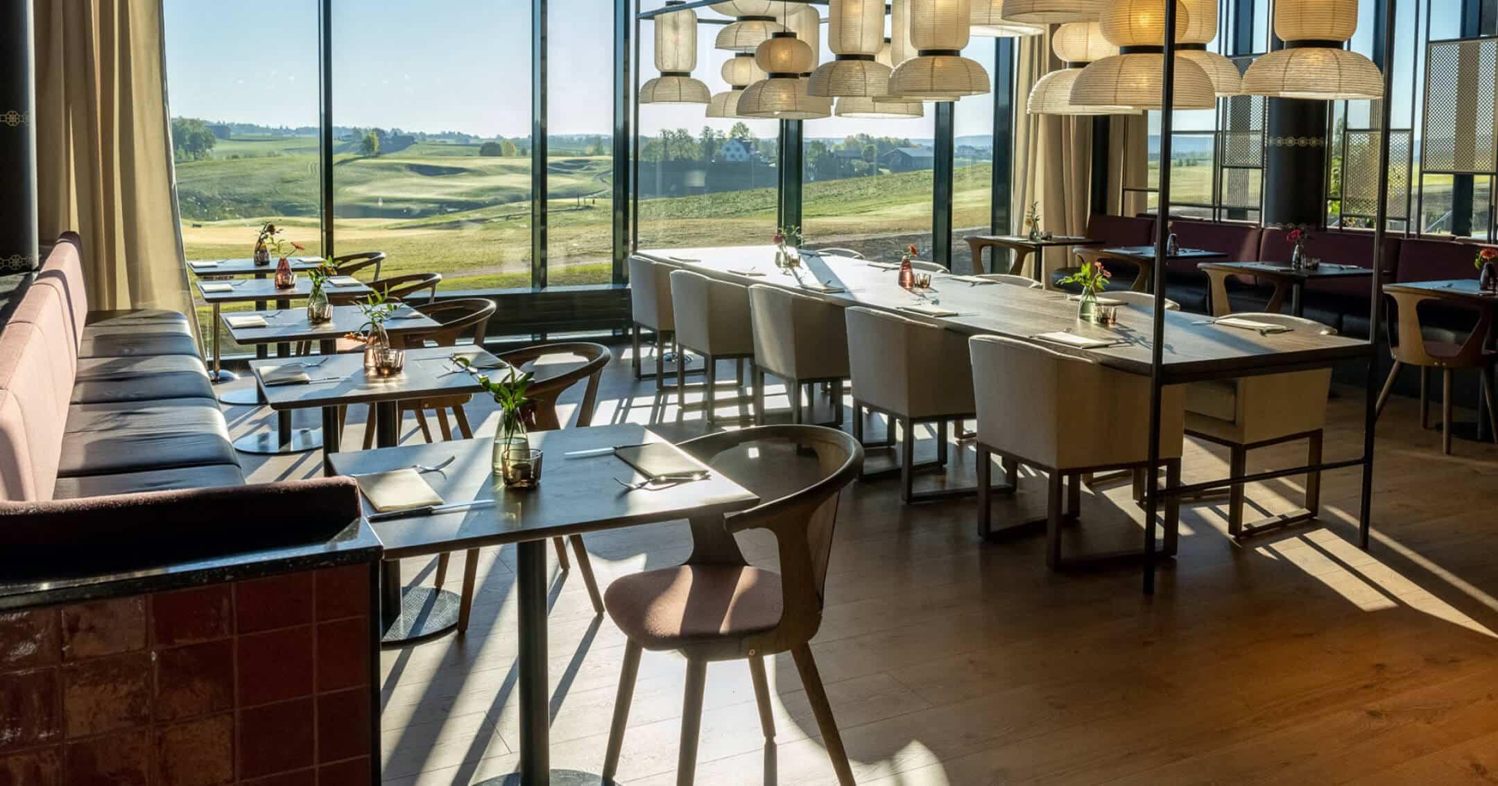 Brasserie dining room at Lily Country Club overlooking the golf course