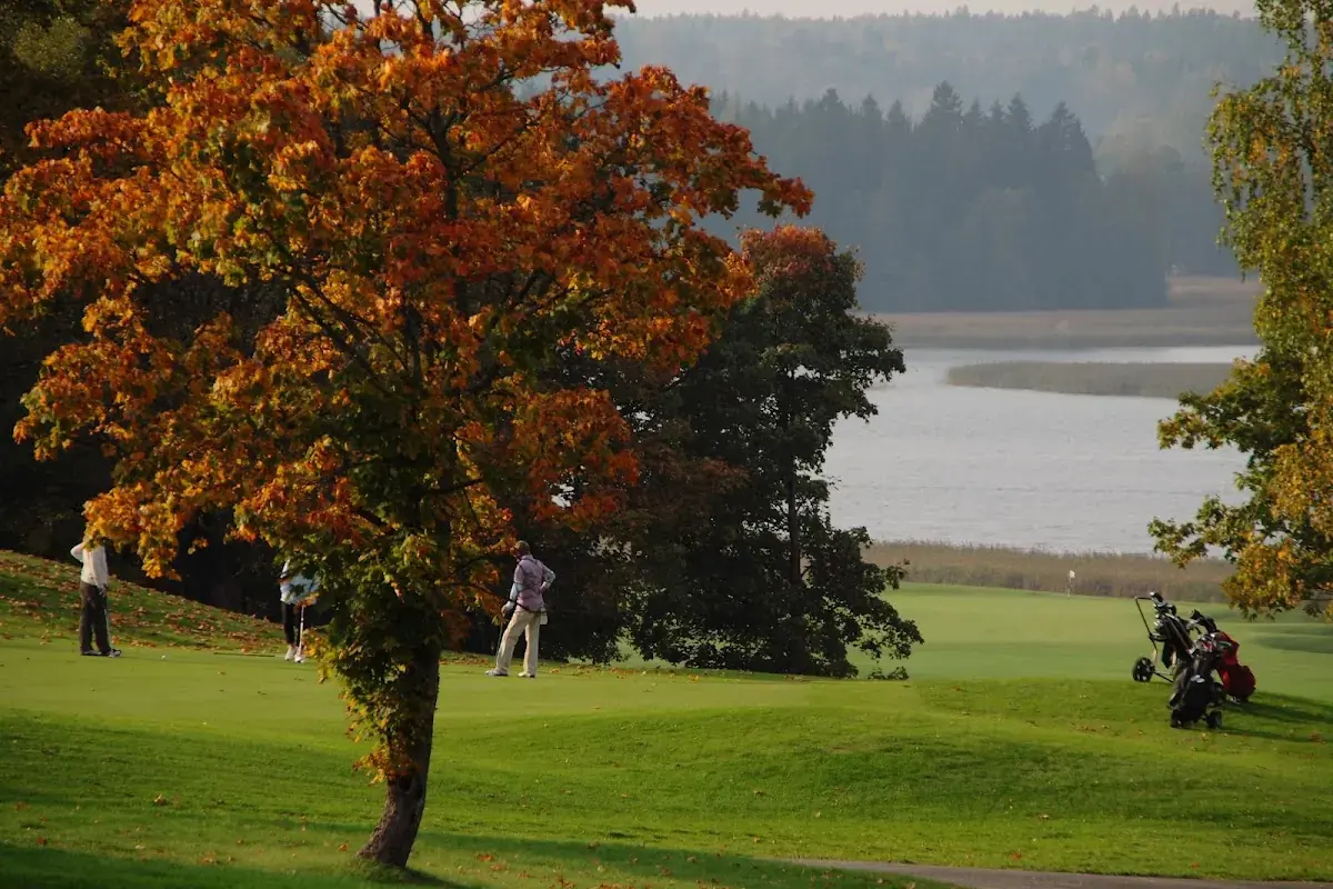 Autumn fairway beside the water at Nordcenter