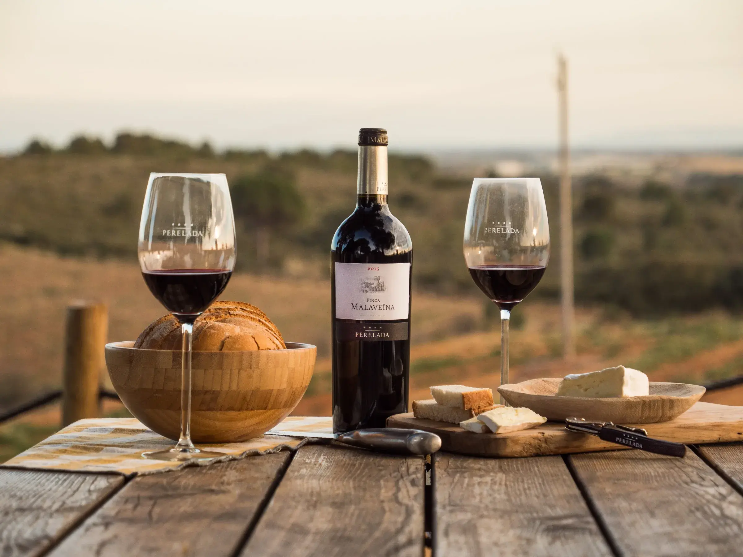 Peralada wine served with bread and cheese
