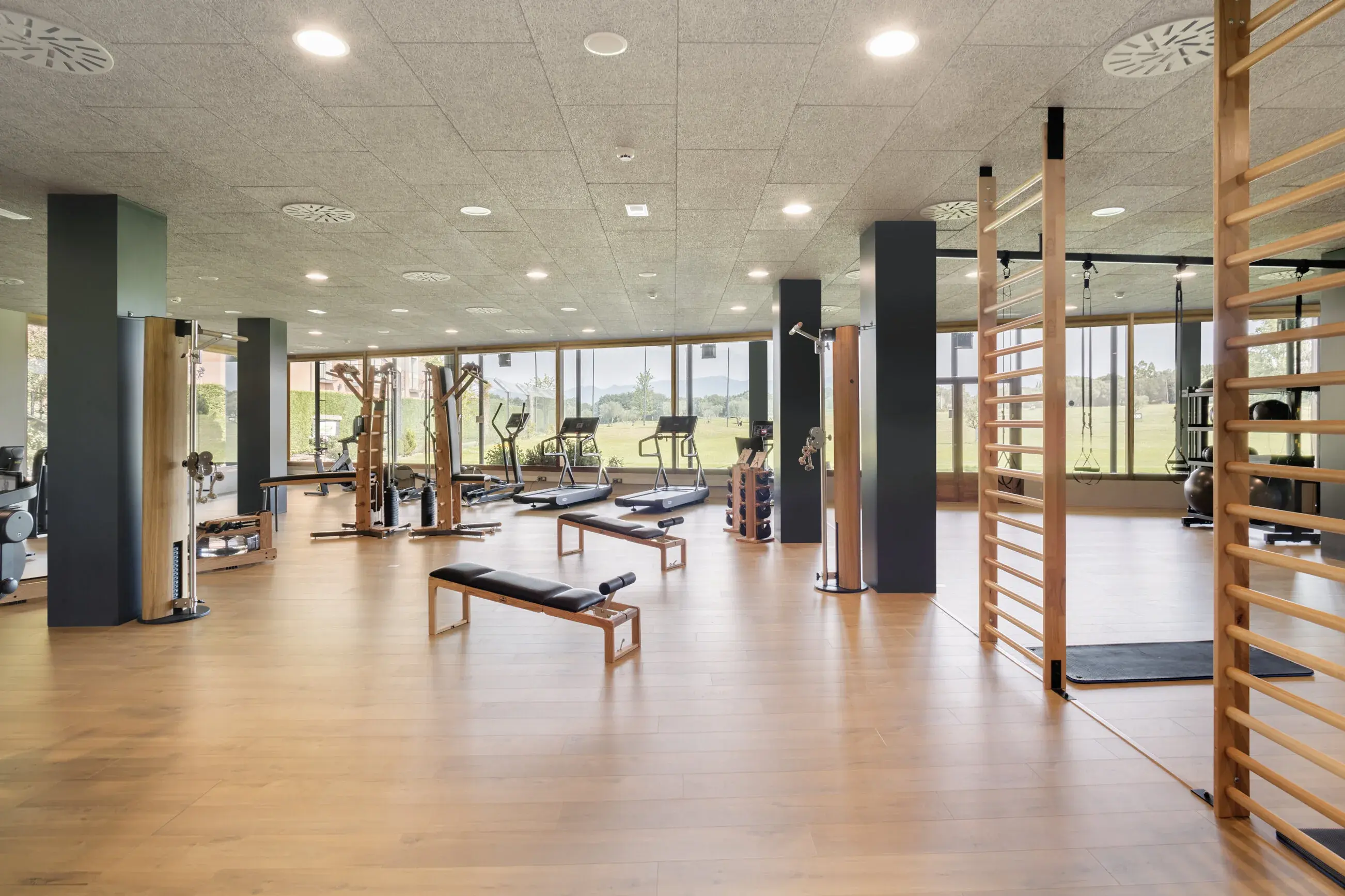 Gym at Hotel Peralada overlooking the resort grounds