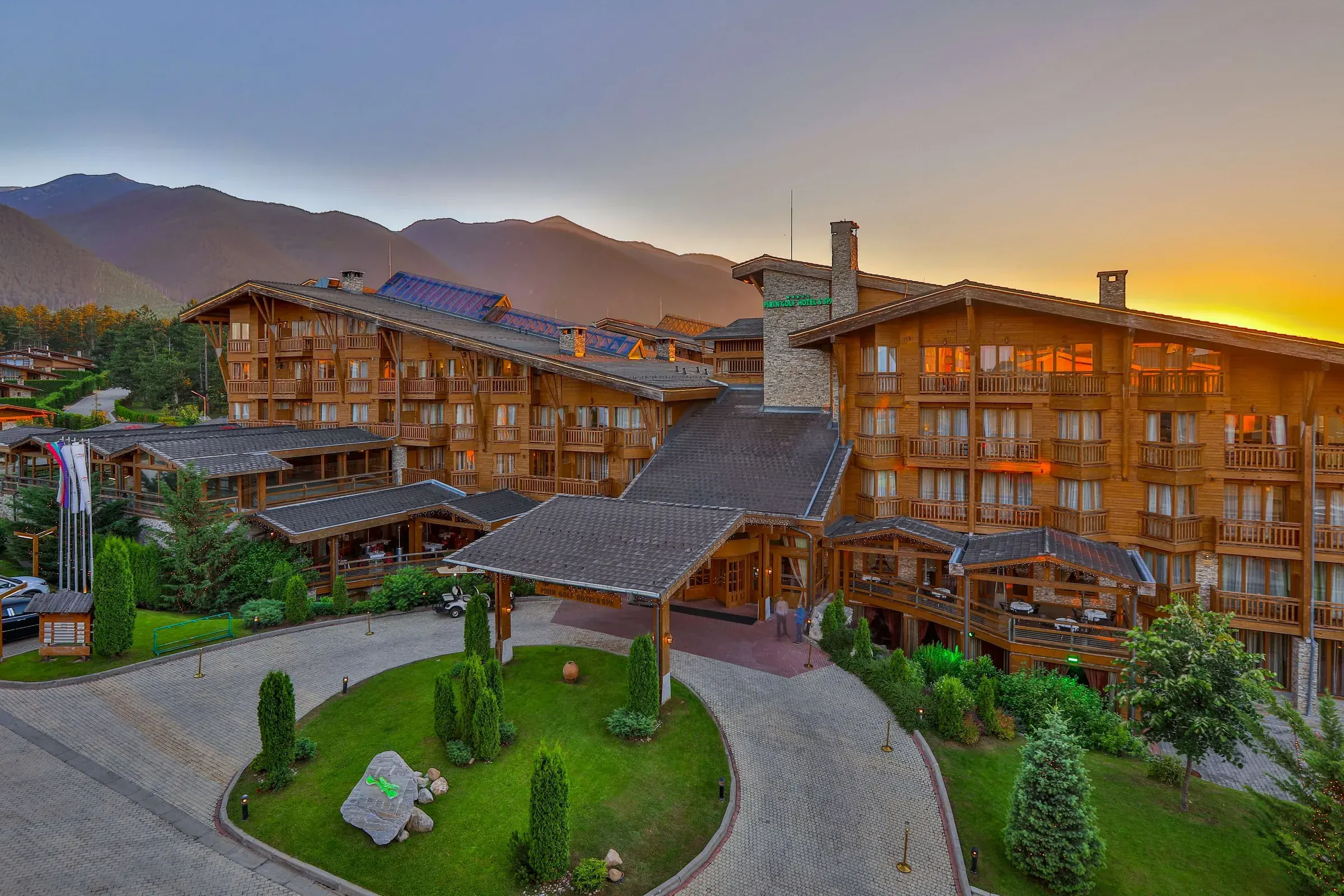 Pirin Golf Hotel exterior at sunset
