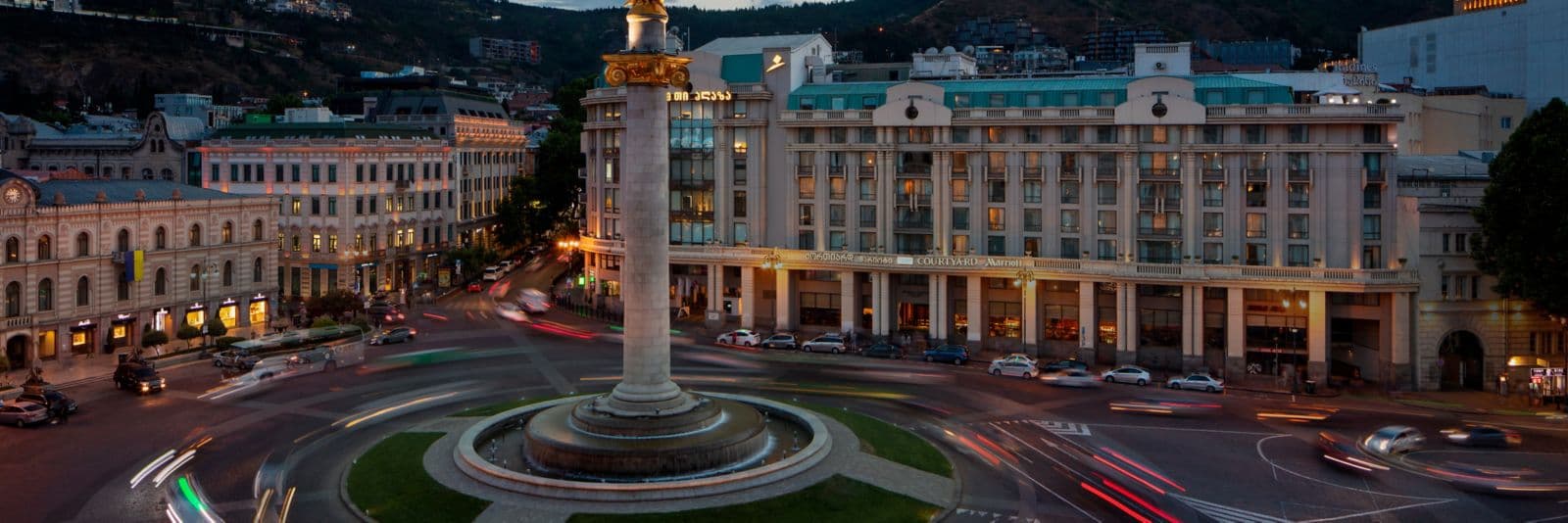 Courtyard by Marriott Tbilisi overlooking Freedom Square at dusk