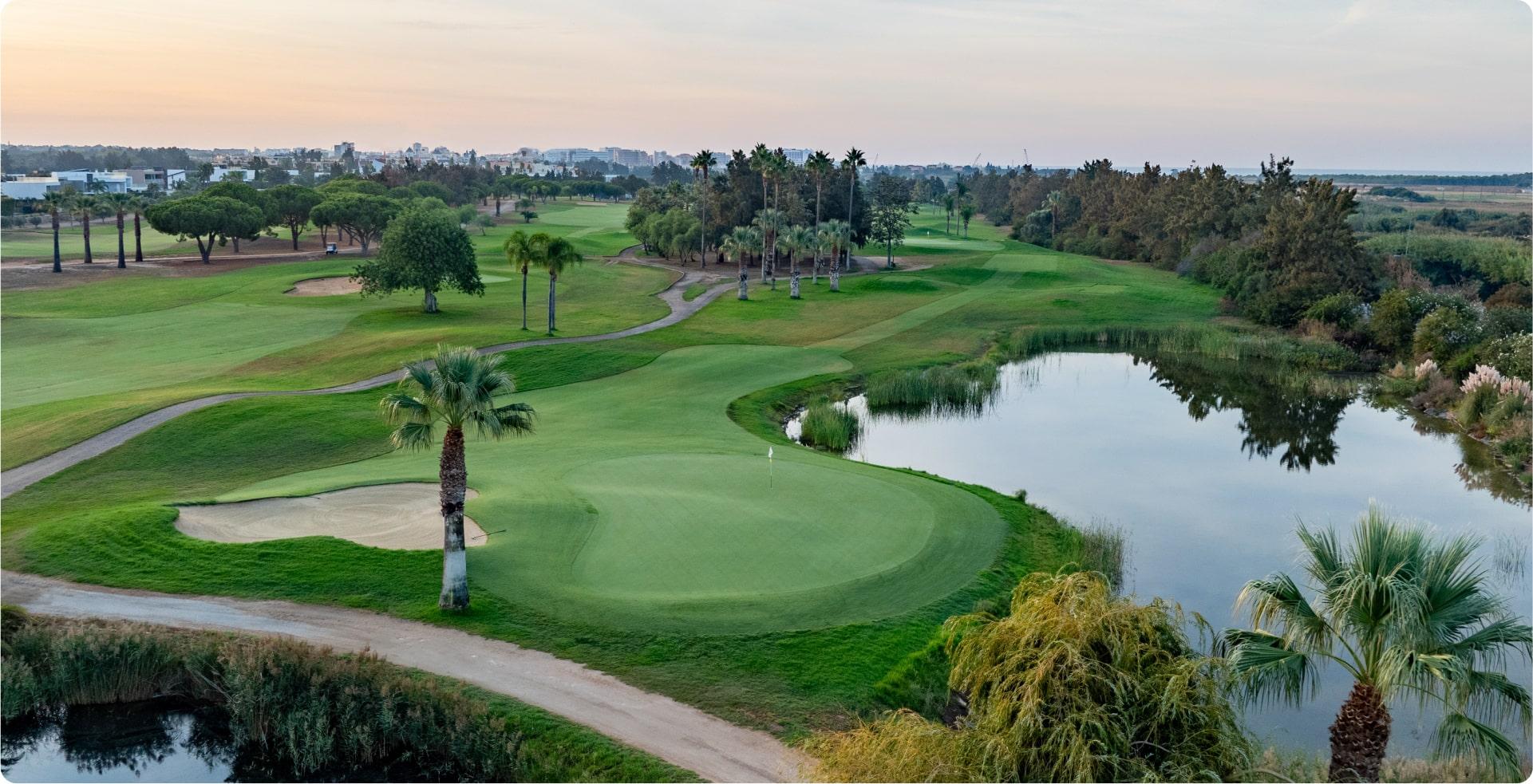 Lakeside green and palm trees on the Laguna course at Vilamoura