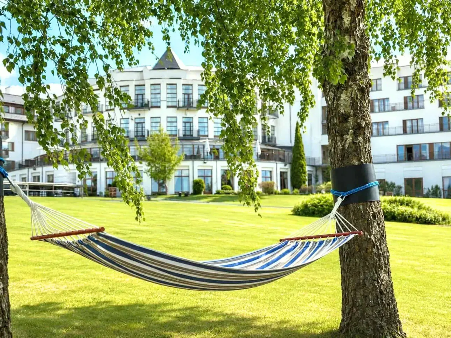 Hammock on the lawn in front of the Vilnius Grand Resort hotel